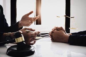 Attorneys discussing about a Chapter 11 bankruptcy case in Milwaukee.