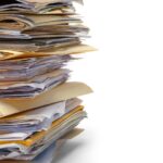 stack of legal documents in folders_s