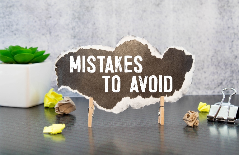 Notepad with text Mistakes To Avoid