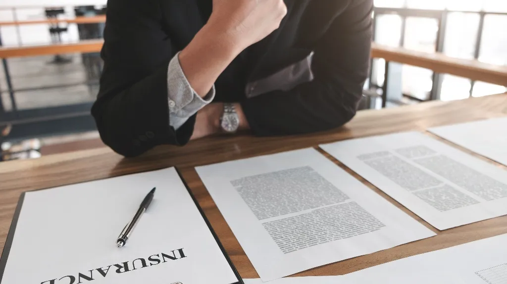 businessman with an insurance policy